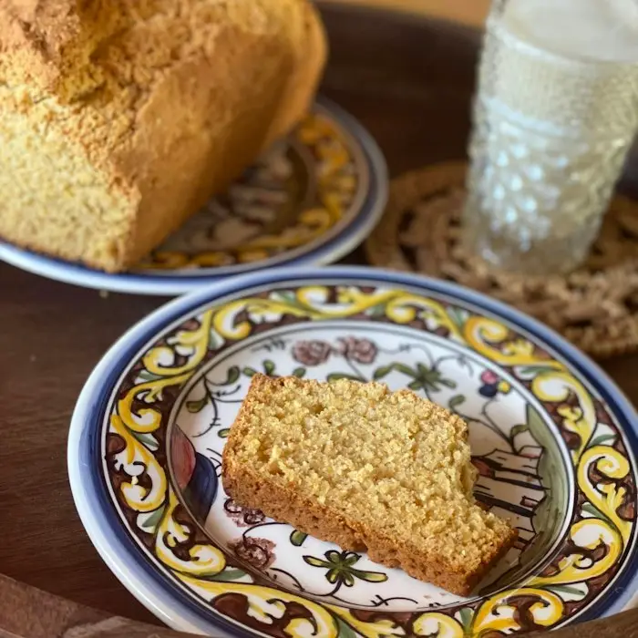 A slice of corn cake served on a plate